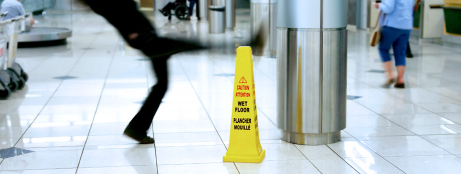 Man slipping on wet tile