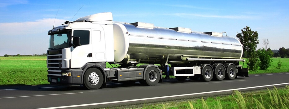 Tanker truck driving on road