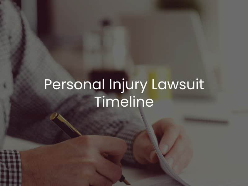 Personal Injury Lawyer Looking at Documents for a Client